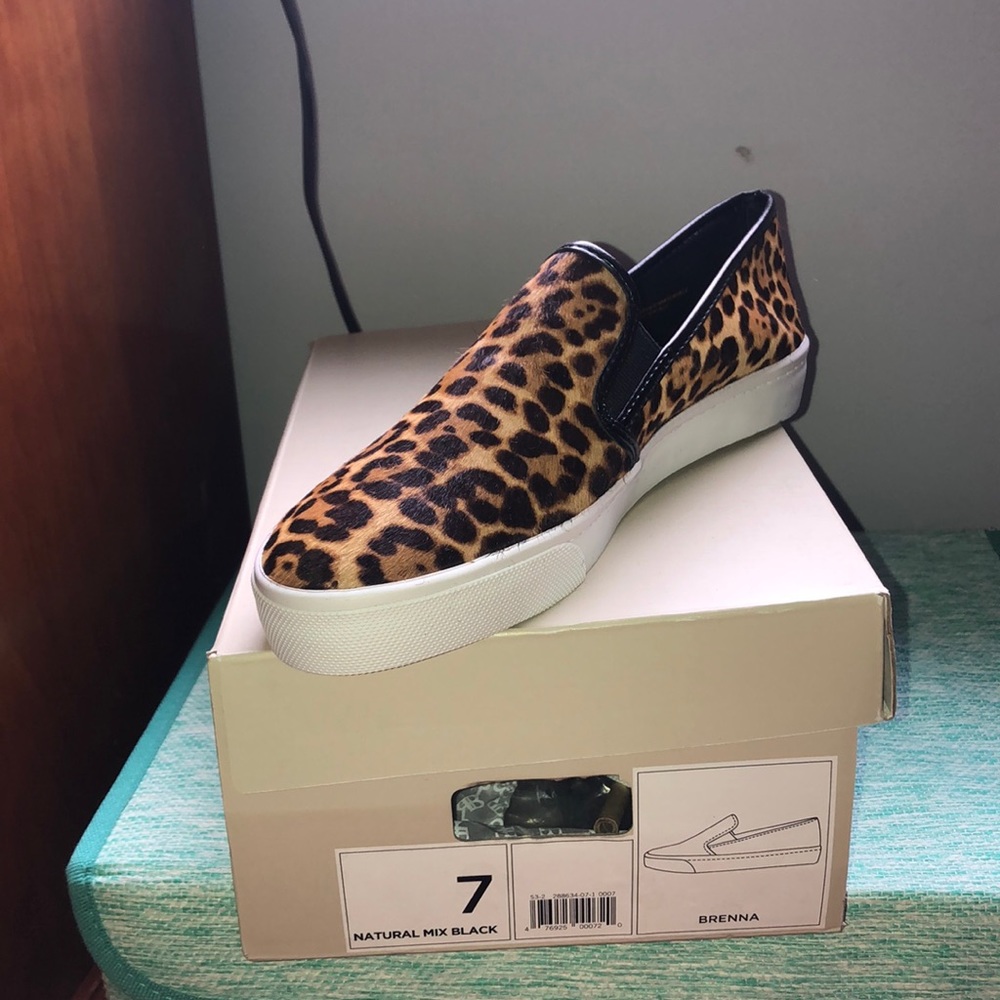 Size 7 animal print slip on sneakers